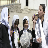 Girls blowing bubbles